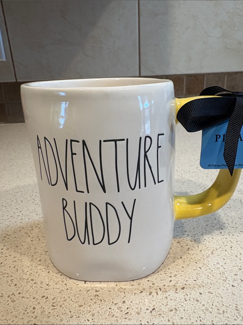 Rae Dunn x Disney Pixar NWT
Adventure Buddy Ceramic Mug - Yellow Handle